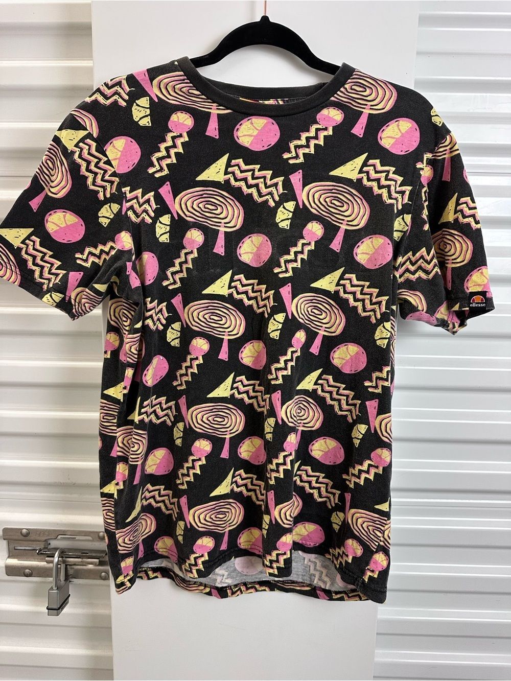 ELLESSE Abstract Geo Print Black T-Shirt with Pink & Yellow Accents
